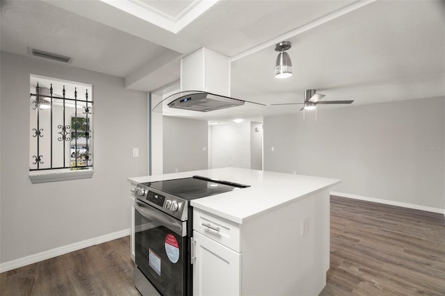 kitchen with white cabinets, visible vents, dark wood-style flooring, baseboards, and electric stove