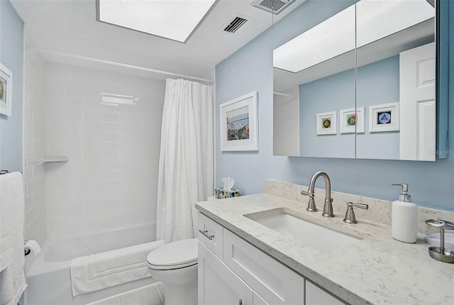 151 Vista Hermosa Cir Unit 31C, Sarasota, FL 34242 - full bath with toilet, shower / bath combo with shower curtain, and vanity