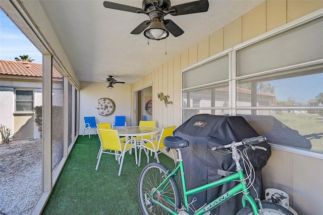 151 Vista Hermosa Cir Unit 31C, Sarasota, FL 34242 - sunroom with a ceiling fan, plenty of natural light, and outdoor dining area
