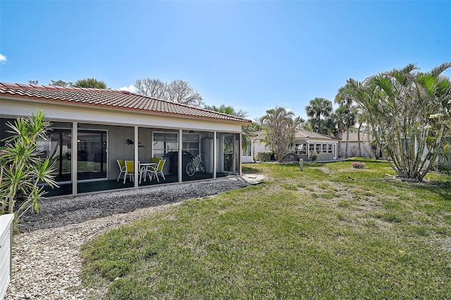 151 Vista Hermosa Cir Unit 31C, Sarasota, FL 34242 - view of green lawn featuring a sunroom
