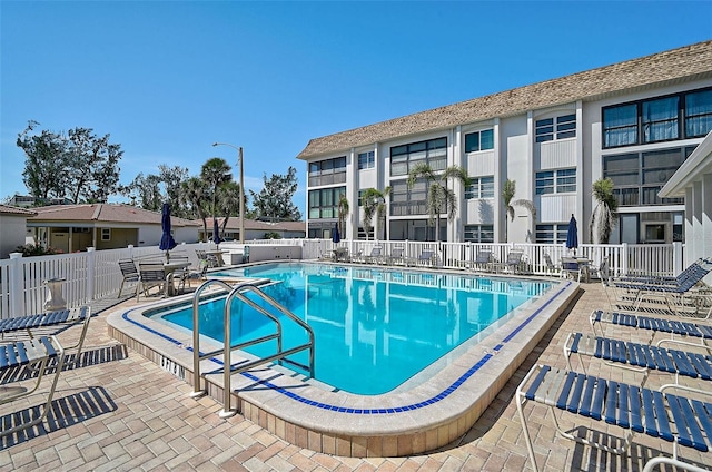 151 Vista Hermosa Cir Unit 31C, Sarasota, FL 34242 - community pool featuring a patio area