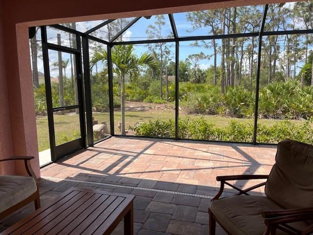 7286 Mineola Rd, Englewood, FL 34224 - sunroom / solarium featuring healthy amount of natural light