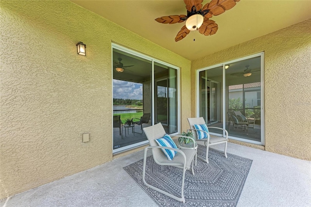 view of patio / terrace featuring ceiling fan