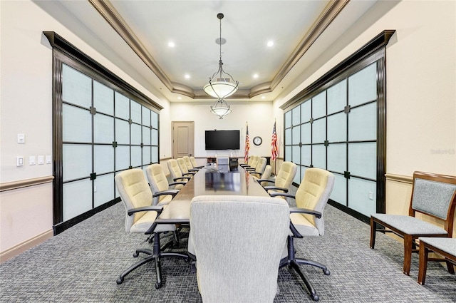 carpeted office space featuring a tray ceiling, recessed lighting, crown molding, baseboards, and healthy amount of natural light