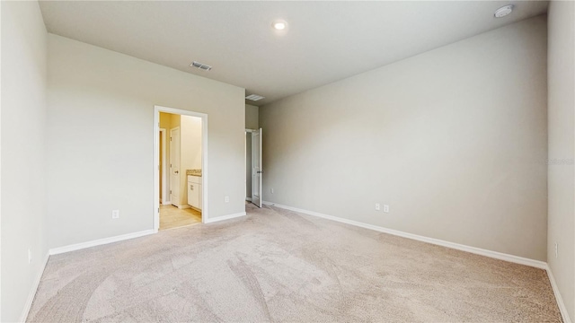 1824 Woodleaf Hammock Ct, Bradenton, FL 34211 - spare room with light carpet, baseboards, and a smoke detector