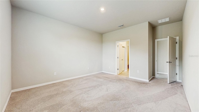 1824 Woodleaf Hammock Ct, Bradenton, FL 34211 - unfurnished bedroom with light colored carpet, baseboards, and connected bathroom