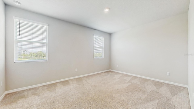 1824 Woodleaf Hammock Ct, Bradenton, FL 34211 - unfurnished room featuring light colored carpet and baseboards