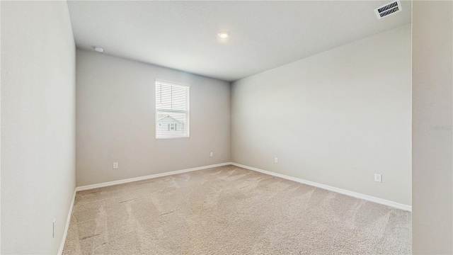 1824 Woodleaf Hammock Ct, Bradenton, FL 34211 - spare room featuring light carpet and baseboards