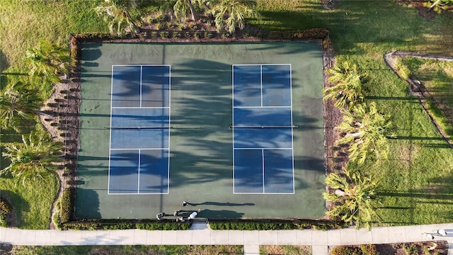 1824 Woodleaf Hammock Ct, Bradenton, FL 34211 - view of home's exterior with fence and a tennis court