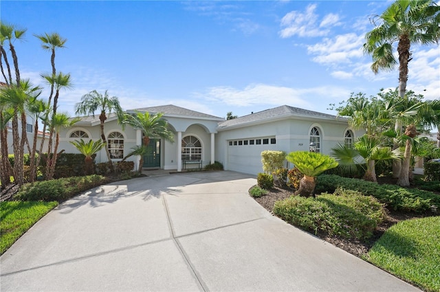 7424 Arrowhead Run, Lakewood Ranch, FL 34202 - view of front facade featuring stucco siding, concrete driveway, and an attached garage