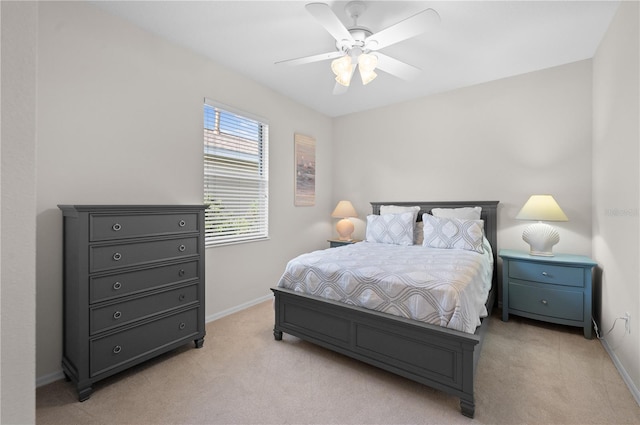 7424 Arrowhead Run, Lakewood Ranch, FL 34202 - bedroom featuring light carpet, baseboards, and ceiling fan