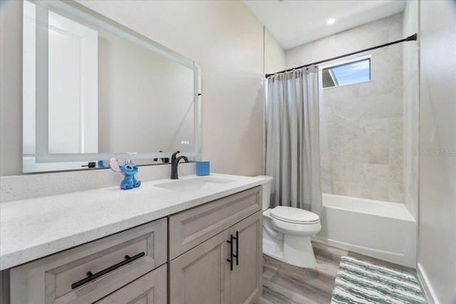 18274 Grace Ave, Port Charlotte, FL 33948 - bathroom with vanity, wood finished floors, and shower / bathtub combination with curtain