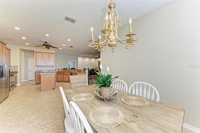dining area with recessed lighting, a ceiling fan, light tile patterned floors, a chandelier, and baseboards