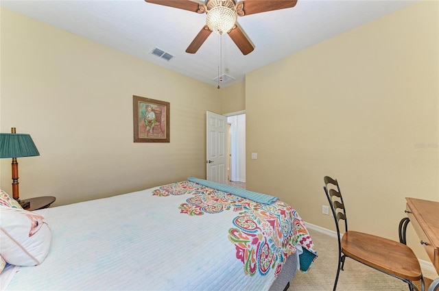 carpeted bedroom featuring a ceiling fan