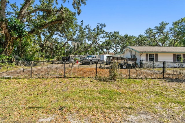 view of yard featuring fence