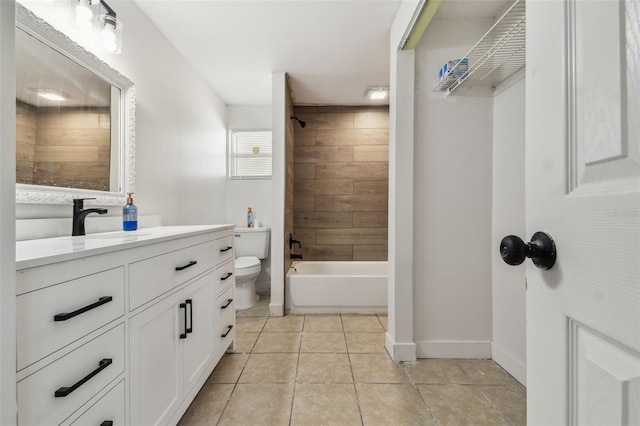 bathroom featuring toilet, shower / tub combination, vanity, tile patterned floors, and baseboards