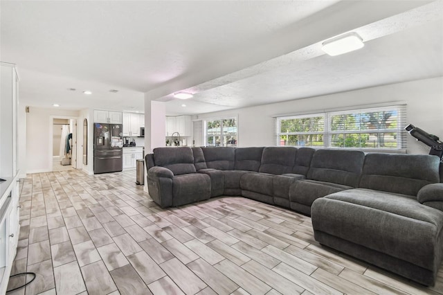 living room with recessed lighting