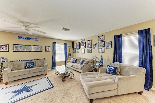 4211 30th Ln E, Bradenton, FL 34208 - living area with ceiling fan, carpet, baseboards, and visible vents