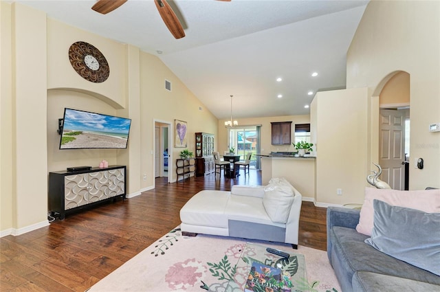 living area with high vaulted ceiling, wood finished floors, ceiling fan, baseboards, and recessed lighting