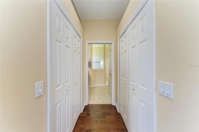 hall with dark wood finished floors