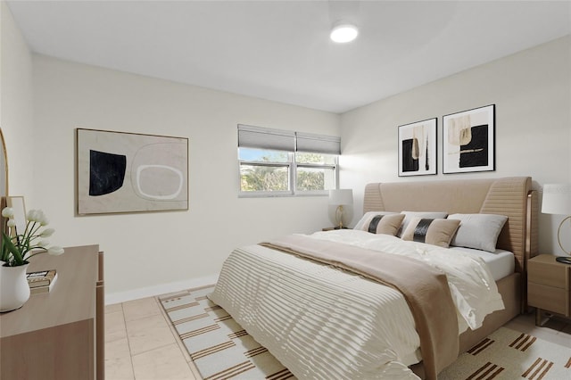 bedroom featuring baseboards