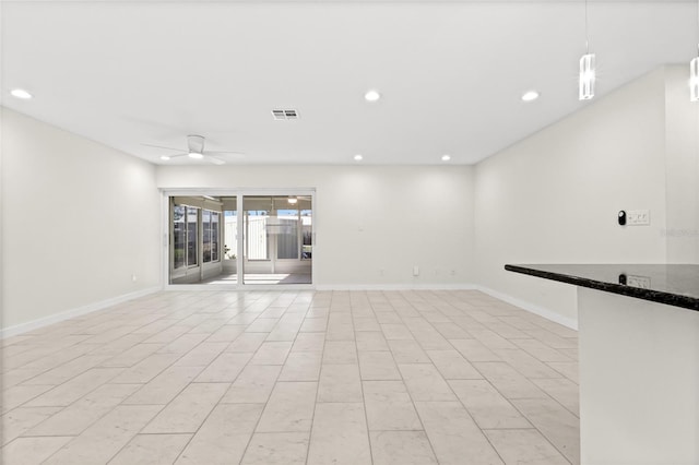 empty room with visible vents, baseboards, ceiling fan, and recessed lighting