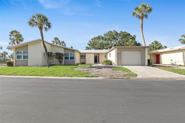ranch-style house with concrete driveway, a garage, stucco siding, and a front yard