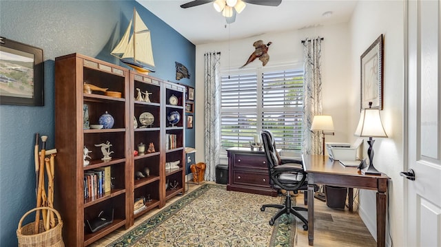 20359 Cristoforo Pl, Venice, FL 34293 - office area featuring a ceiling fan, wood finished floors, and baseboards
