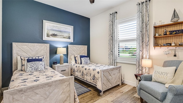 20359 Cristoforo Pl, Venice, FL 34293 - bedroom with wood finished floors and baseboards