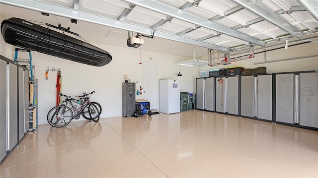 20359 Cristoforo Pl, Venice, FL 34293 - garage with freestanding refrigerator and a garage door opener