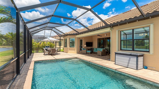 20359 Cristoforo Pl, Venice, FL 34293 - swimming pool featuring an outdoor hangout area, a patio, ceiling fan, and glass enclosure