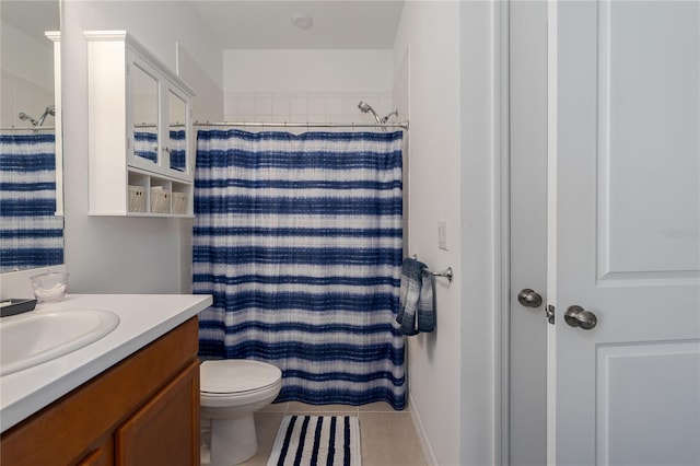bathroom featuring toilet, tile patterned flooring, vanity, and curtained shower