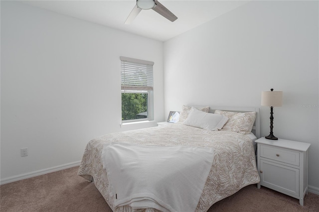 carpeted bedroom with baseboards and ceiling fan