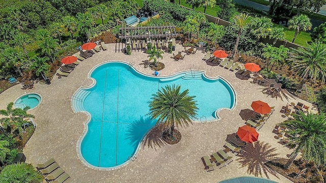 pool with a patio area