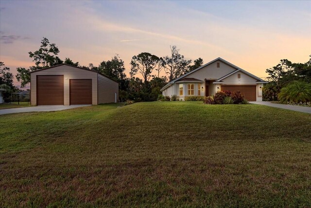 4466 Manila Ave, North Port, FL 34288 - view of front of property with a front yard, a garage, and an outdoor structure