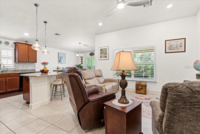 4466 Manila Ave, North Port, FL 34288 - living room featuring light tile patterned floors, healthy amount of natural light, a ceiling fan, recessed lighting, and baseboards