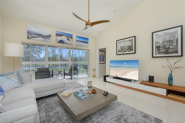 6748 Fairview Ter Unit 4-202, Bradenton, FL 34203 - living room featuring healthy amount of natural light, tile patterned floors, high vaulted ceiling, and ceiling fan