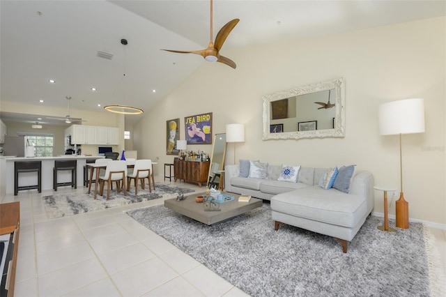 6748 Fairview Ter Unit 4-202, Bradenton, FL 34203 - living area with ceiling fan, light tile patterned floors, recessed lighting, and high vaulted ceiling