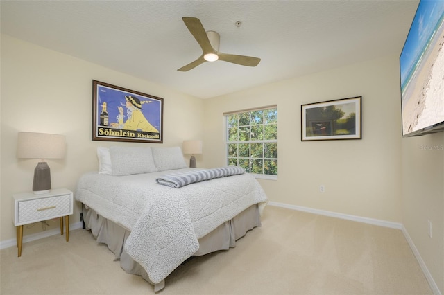 6748 Fairview Ter Unit 4-202, Bradenton, FL 34203 - bedroom with light colored carpet, baseboards, and ceiling fan
