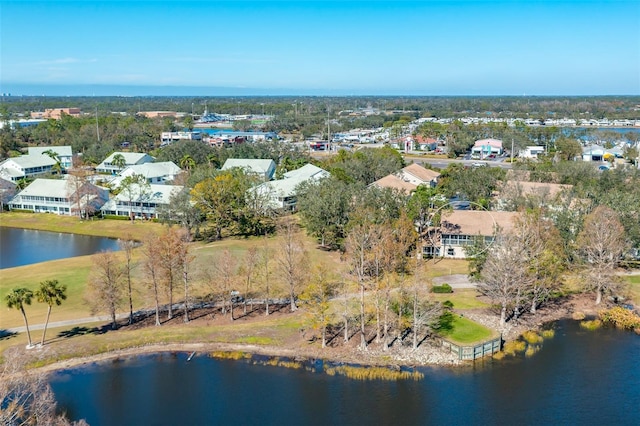 6748 Fairview Ter Unit 4-202, Bradenton, FL 34203 - aerial view of property and surrounding area featuring a large body of water and a tree filled landscape
