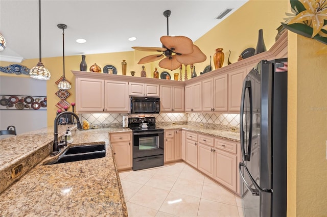 490 Pine Lily Way, Venice, FL 34293 - kitchen with black appliances, a sink, tasteful backsplash, decorative light fixtures, and light tile patterned floors
