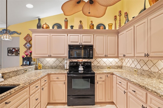 490 Pine Lily Way, Venice, FL 34293 - kitchen featuring black appliances, decorative backsplash, and light stone countertops