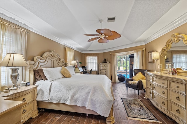 490 Pine Lily Way, Venice, FL 34293 - bedroom with access to exterior, dark wood-style floors, a tray ceiling, ornamental molding, and a ceiling fan
