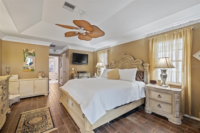 490 Pine Lily Way, Venice, FL 34293 - bedroom featuring a raised ceiling, wood finish floors, crown molding, baseboards, and ceiling fan