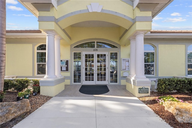 490 Pine Lily Way, Venice, FL 34293 - entrance to property with french doors and stucco siding
