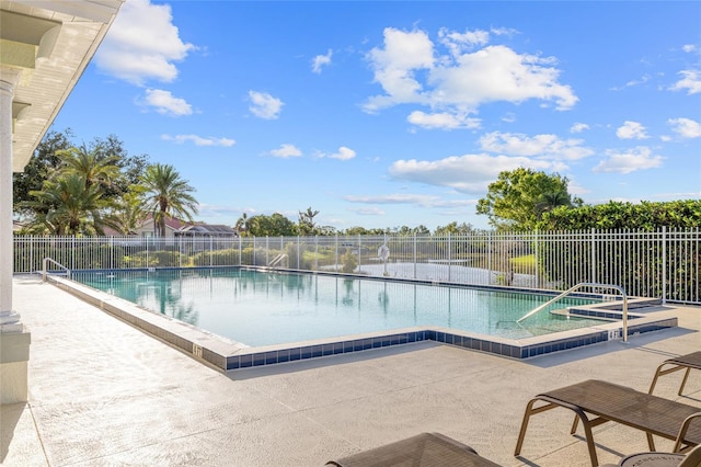 490 Pine Lily Way, Venice, FL 34293 - community pool featuring fence and a patio area