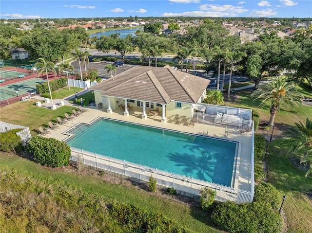 490 Pine Lily Way, Venice, FL 34293 - community pool featuring fence, a water view, and a patio area
