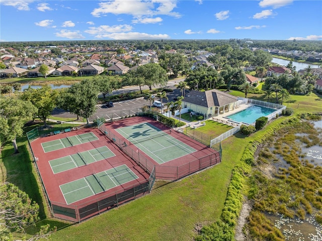 490 Pine Lily Way, Venice, FL 34293 - aerial perspective of suburban area with a pool and a large body of water