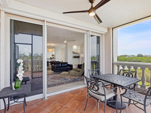 sunroom with tile patterned floors