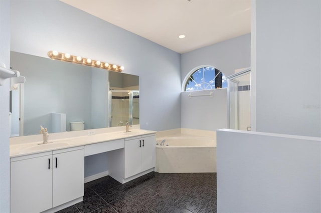 4063 Westbourne Cir, Sarasota, FL 34238 - full bathroom with a stall shower, a bath, double vanity, recessed lighting, and tile patterned floors